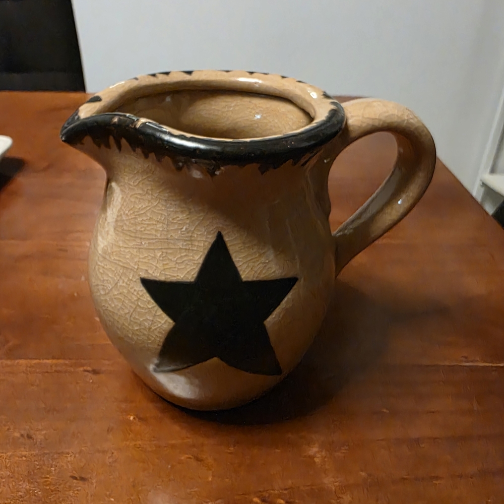 Rustic Star-Embellished Tan and Black Pitcher